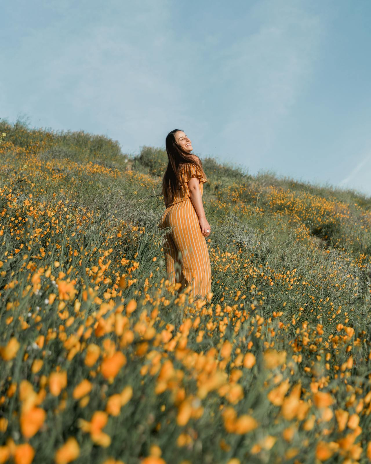 Woman Standing on Flower Field